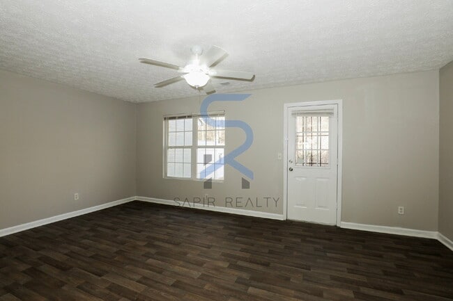 Building Photo - Move in before February 15th and choose your reward: a $250 Amazon Gift Card or a 55" Smart TV!