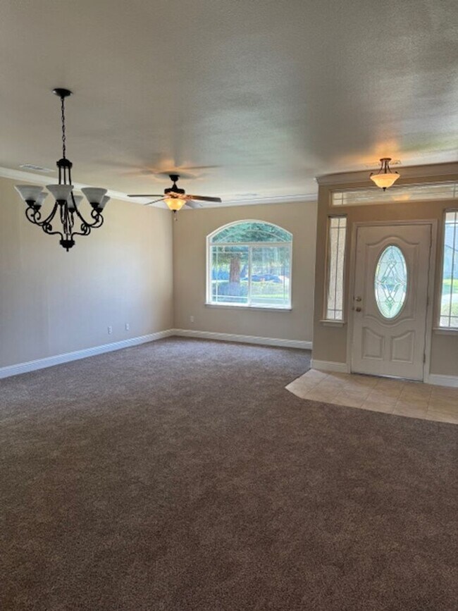 Building Photo - Enterprise Neighborhood 3 Bedroom Home with bonus room and 3 car garage- Landscaping Included!