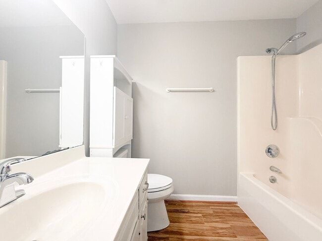 Building Photo - Spacious 3-Bedroom Home with Screened Porch, 2-Car Garage + Workshop