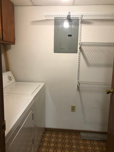 In unit washer and dryer with storage space and hanging rack - 102 Hartford Ct