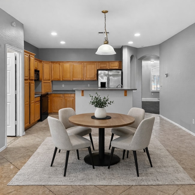 Building Photo - Single-level 4 bed, 2 bath home with tandem 3-car garage and RV gate.