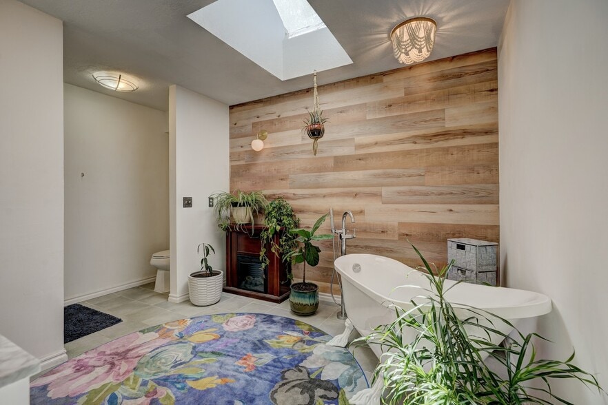 Master Bathroom with Clawfoot Tub, Skylight, and Walk-In Shower - 1409 Folkstone