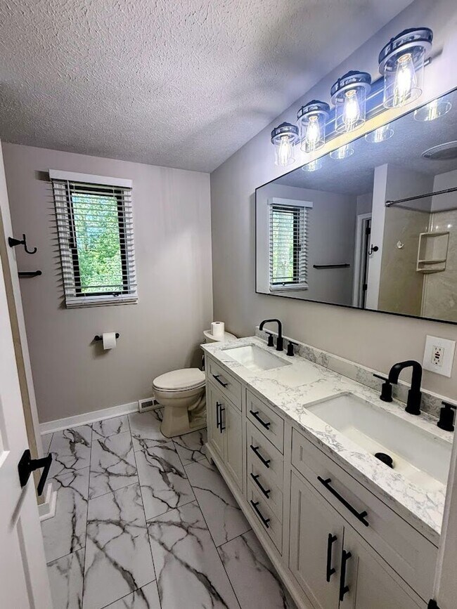 Building Photo - Four-bedroom two-bathroom home for rent in Jackson Township