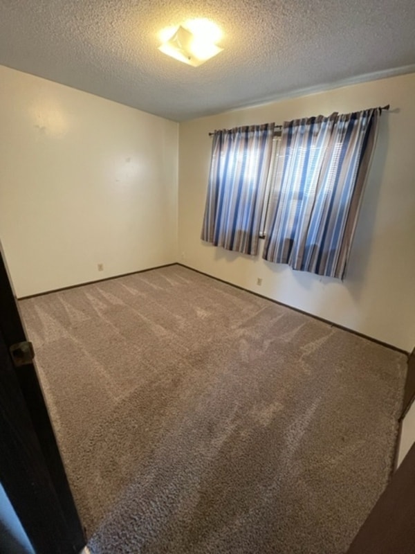 Building Photo - 909 E 24th Ave