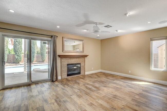 Building Photo - Gorgeous 4 Bedroom, 2 Story Home with a Beautiful Pool in the Lakes!