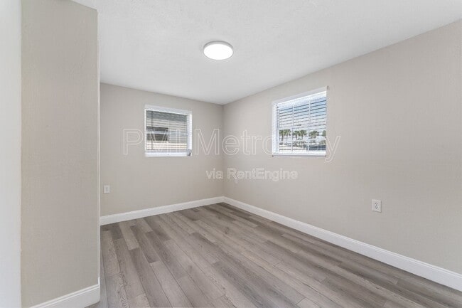 Building Photo - 6121 N Falkenburg Rd