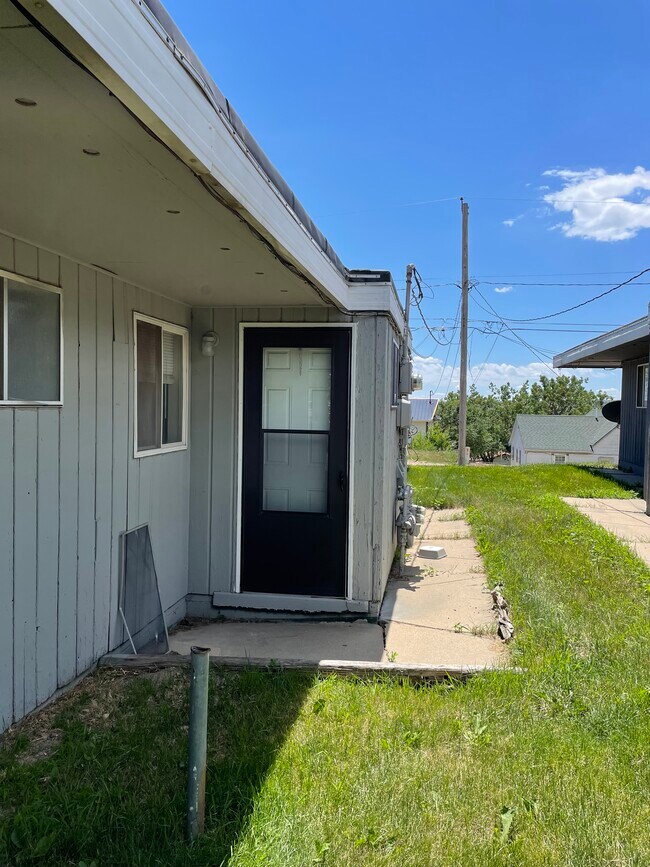 Side Door that leads into the Laundry Area - 131 E Nowlin St