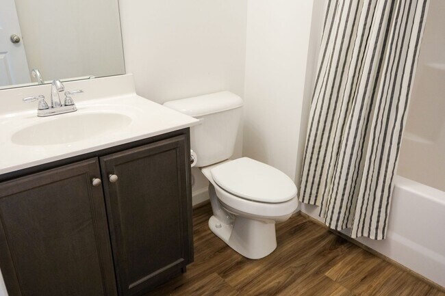 Building Photo - Like-new 3 bedroom, 2.5 bath house with an organic pond!