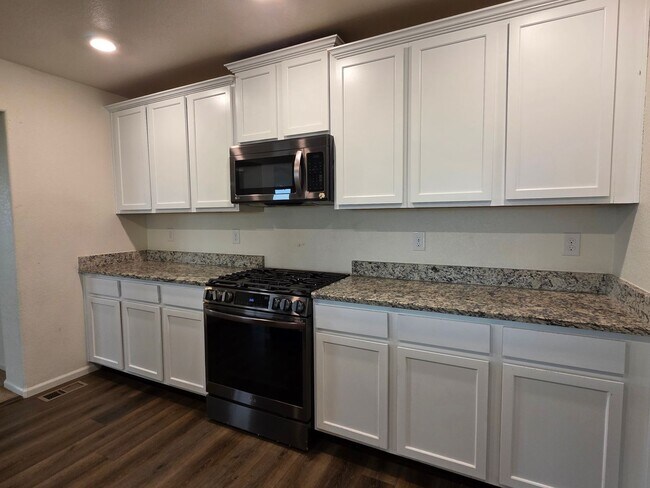 Building Photo - MASSIVE 5 Bedroom Home In Bennett!