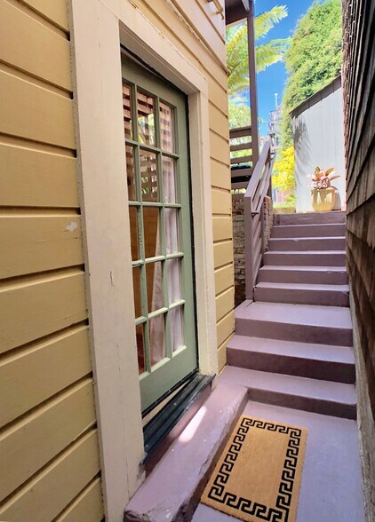 Steps up to the backyard garden. - 1528 Fulton Street