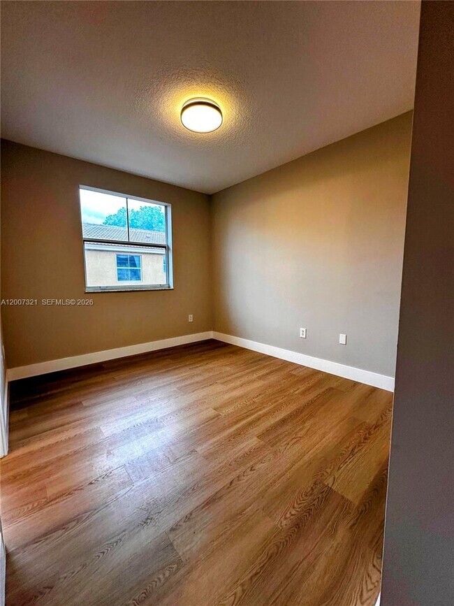 Building Photo - 8445 NW 140th Terrace