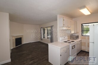 Building Photo - 2-Bed, 2-Bath Condo with One Car Garage