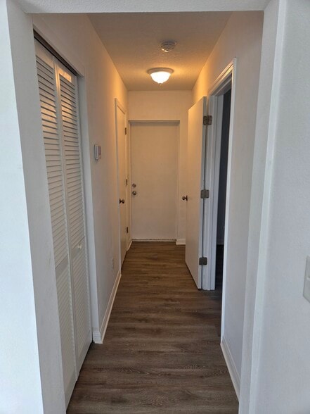 Corridor to Rear Entrance - 803 E Hart St