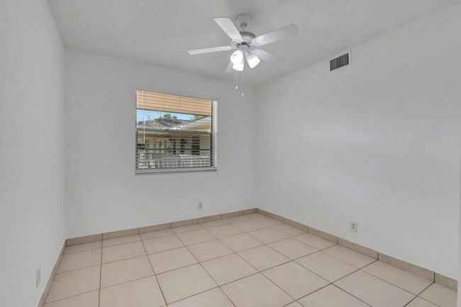 Building Photo - 8431 Royal Palm Blvd
