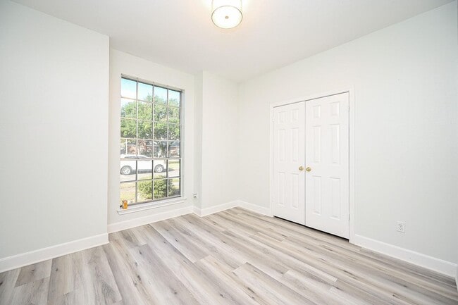 Building Photo - Discover this stunning one-story corner lo...