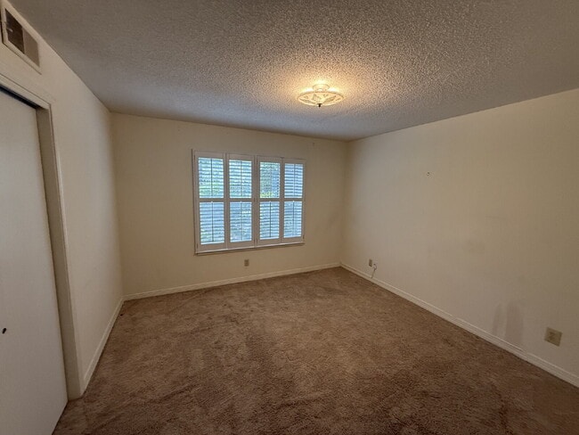 Building Photo - Spanish Villa Condo