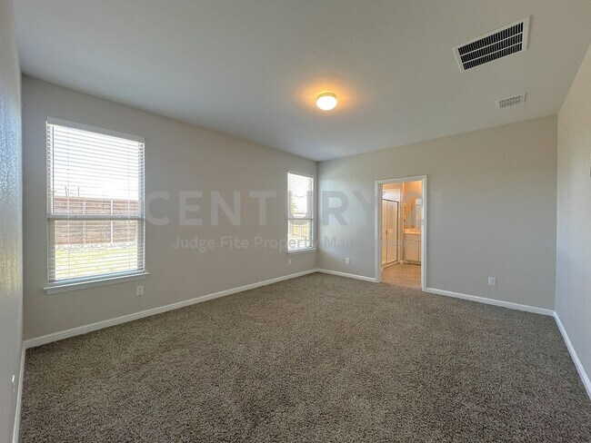 Building Photo - Crisp and Clean 4/2/2 in Boyd For Rent!