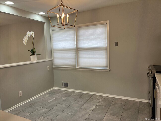 Building Photo - 215-06 23rd Ave