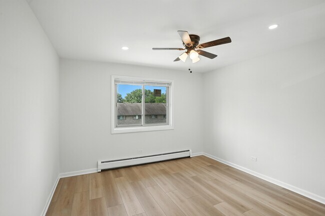 Building Photo - 8231 Woodland Dr