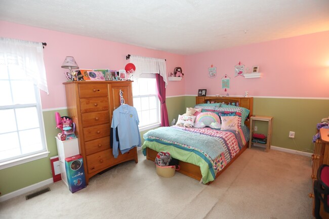 Building Photo - Available -Spacious 2 Car Garaged Townhome...