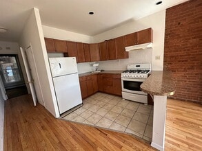 Building Photo - "Chic Urban Oasis: Cozy 1-Bedroom Apartment in Vibrant Brooklyn Locale!"