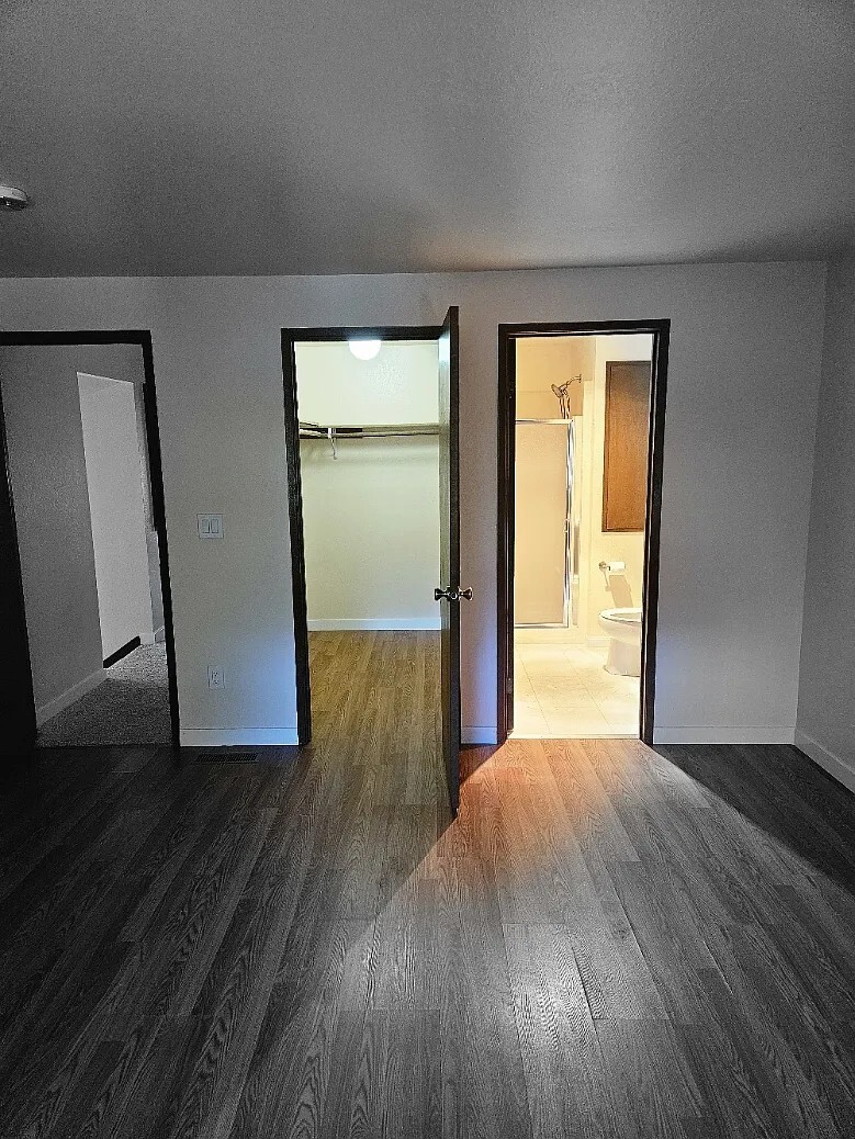 Master bedroom walk in closet and bath. - 10011 33rd Ave SE