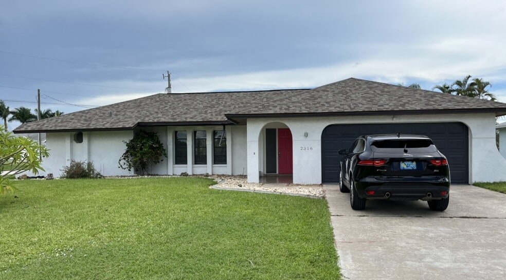 Updated 3/2 home with great neighbors in SE Cape w/ 2 car garage. - 2316 Everest Pky