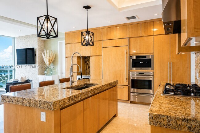 Building Photo - 9701 Collins Ave