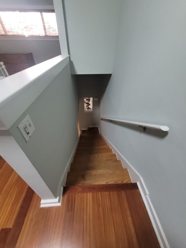 Building Photo - Located in Caneel Cove this 2 bed 2 bath townhome features hardwood floors throughout ,