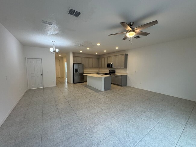 Building Photo - Available Now! Spacious 3-Bedroom Townhome with Fenced Yard in Winter Garden – Washer and Dryer I...