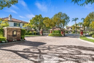 Building Photo - Welcome to this stunning 2-bedroom condo in gated community