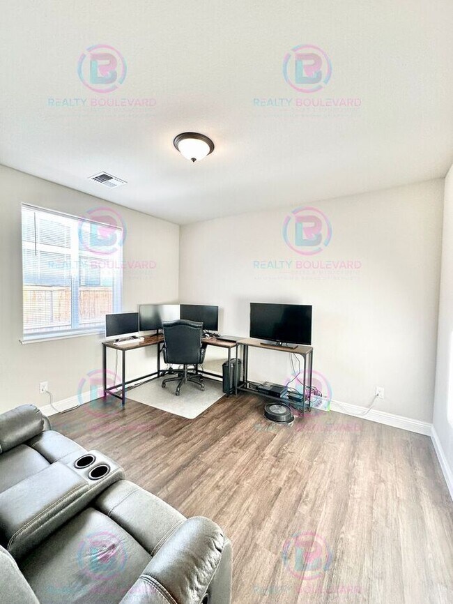 Building Photo - Welcome to your dream home, where modern elegance meets unparalleled convenience!