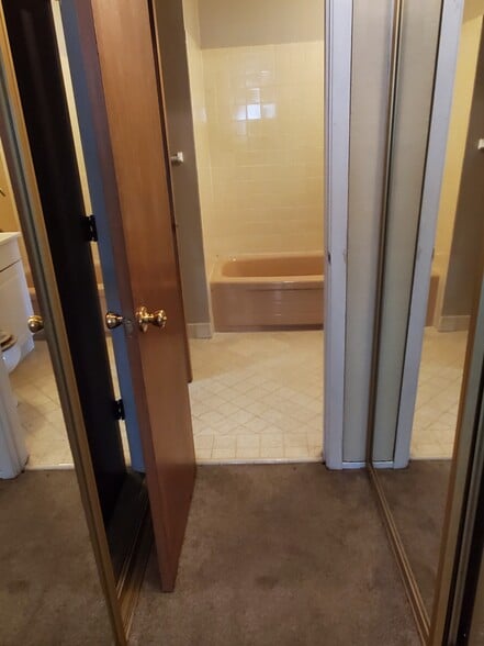 Primary bedroom closets adjacent to bathroom - 1220 La Playa St