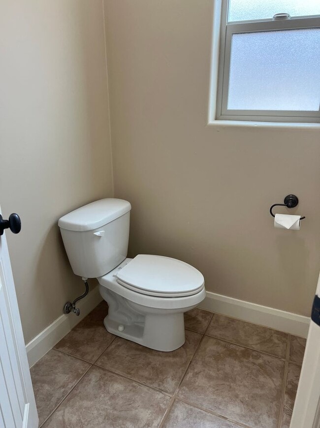 Building Photo - MONTH TO MONTH LEASE ONLY. Beautiful Custo...