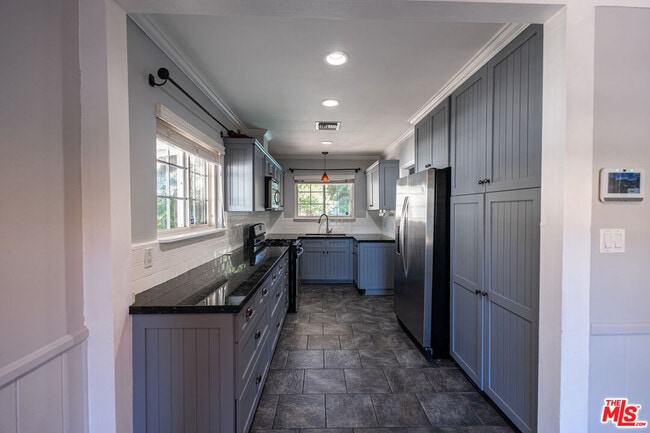 Building Photo - 14236 Enadia Way