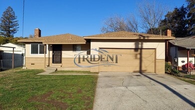 Building Photo - This is a cute updated 3 bedroom 2 bath house