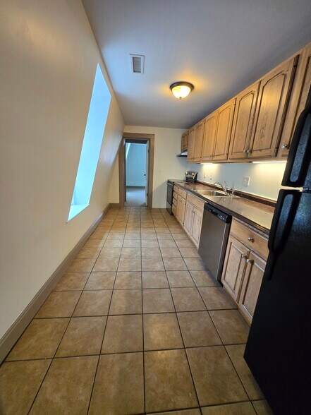 Kitchen from dining room view - 127 Pearl St