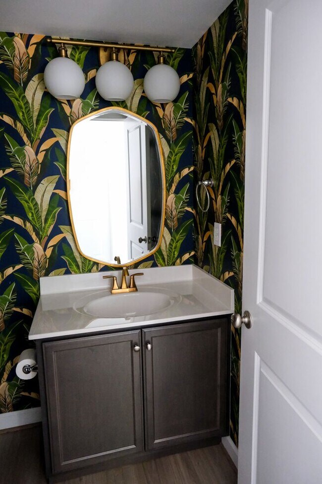 Building Photo - Like-new 3 bedroom, 2.5 bath house with an organic pond!