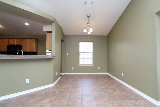 Building Photo - Executive 3-Bedroom Brick Home with Florid...