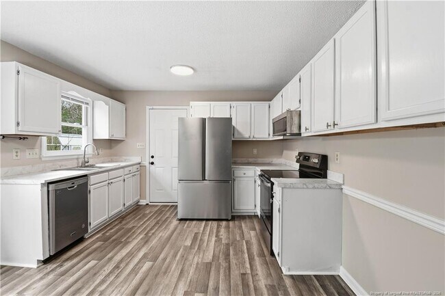 Building Photo - 6813 Foxton Ct
