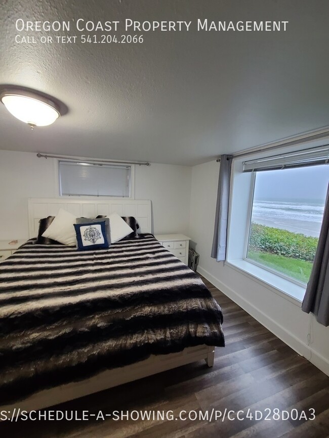 Building Photo - Oceanfront & furnished, this home offers a...