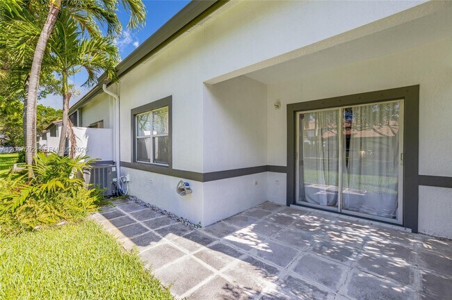 Building Photo - 9820 NW 24th Ct