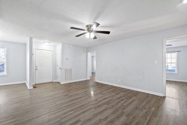 Building Photo - Adorable home with fenced back yard coming...