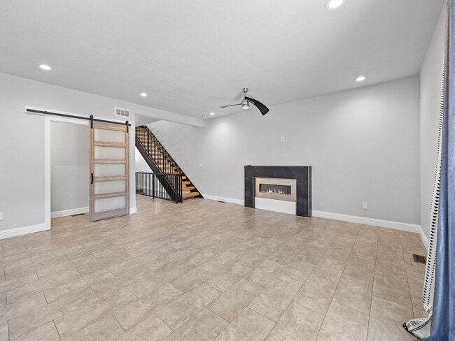 Building Photo - 4-Bedroom Townhome with Finished Basement, Garage & Private Outdoor Space