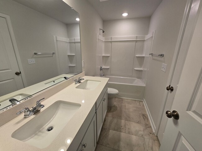 Building Photo - NEWLY BUILT END UNIT TOWNHOME