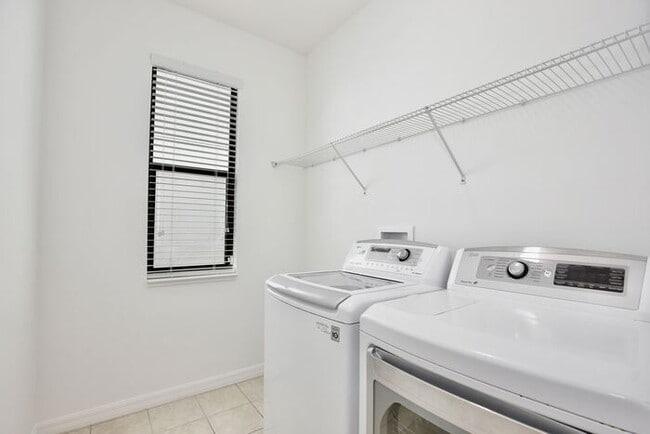 Building Photo - Stylish 4/3 Home with Covered Patio & Gara...