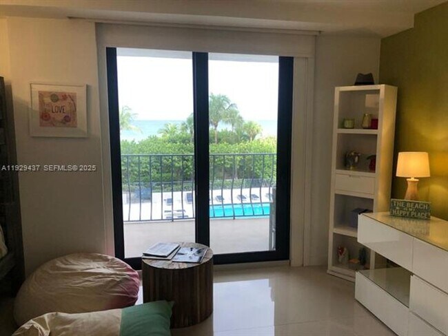 Building Photo - 8877 Collins Ave