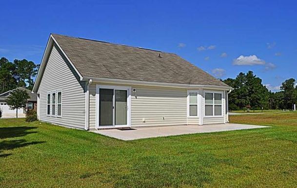 Building Photo - Like New 3 Bedroom & 2 Bath pond front home in Hillsborough! Enjoy the Community Pool, Playground...
