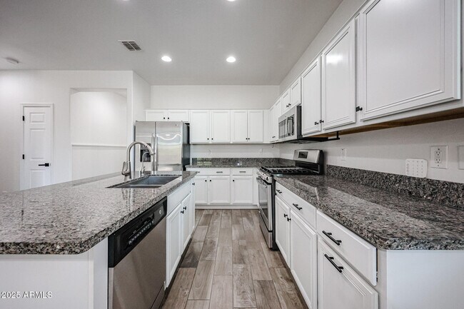 Building Photo - 13159 W Rowel Rd