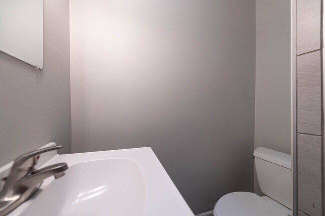 Building Photo - PHA Welcomed! Spacious Home with Private Backyard